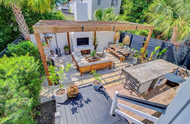 11 Francis St, Charleston, SC 29403 - wooden terrace with an outdoor living space with a fireplace