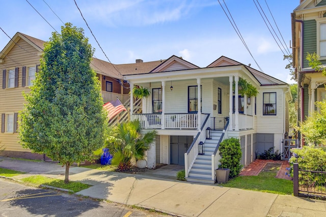 11 Francis St, Charleston, SC 29403 - view of front of property featuring a porch, stairs, and a garage