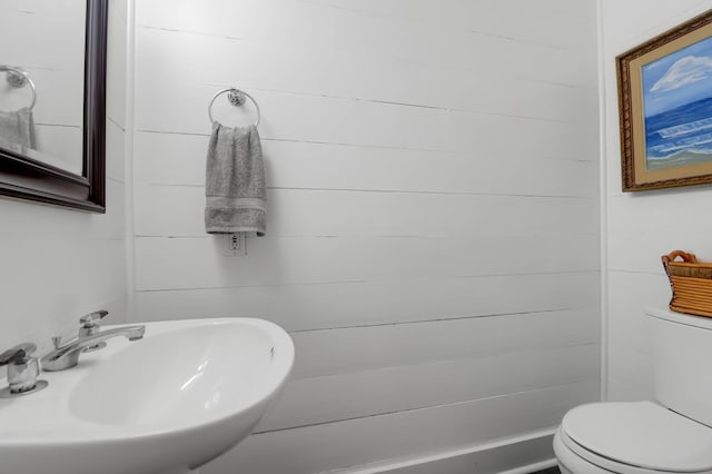 bathroom with sink and toilet