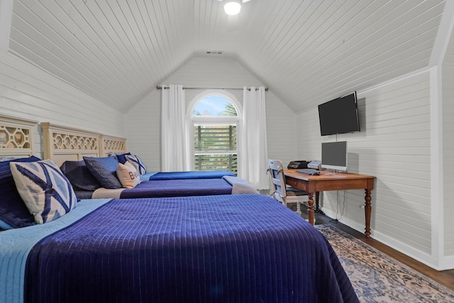 bedroom featuring wooden ceiling, hardwood / wood-style flooring, and lofted ceiling