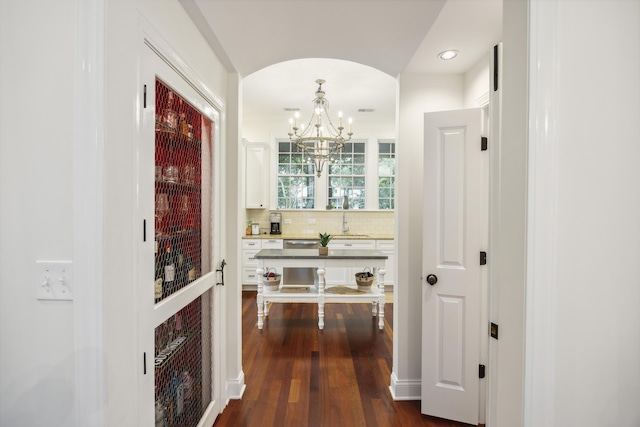 3221 Johnstowne St, Johns Island, SC 29455 - hallway with a chandelier, dark wood finished floors, and recessed lighting