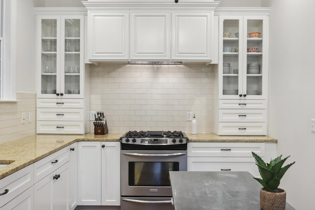 3221 Johnstowne St, Johns Island, SC 29455 - kitchen featuring gas stove, backsplash, white cabinetry, and glass insert cabinets