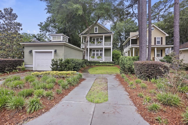3221 Johnstowne St, Johns Island, SC 29455 - view of front of property with a balcony, a garage, and covered porch