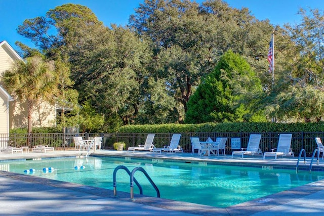 3221 Johnstowne St, Johns Island, SC 29455 - community pool with a patio and view of scattered trees