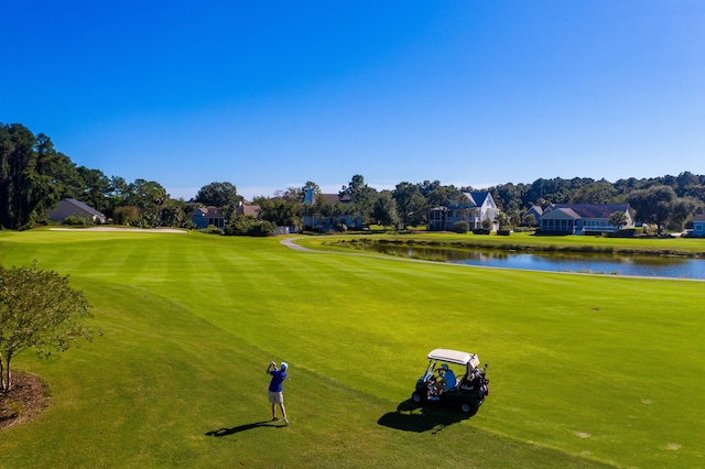 3221 Johnstowne St, Johns Island, SC 29455 - view of property's community with a water view, view of golf course, and a yard