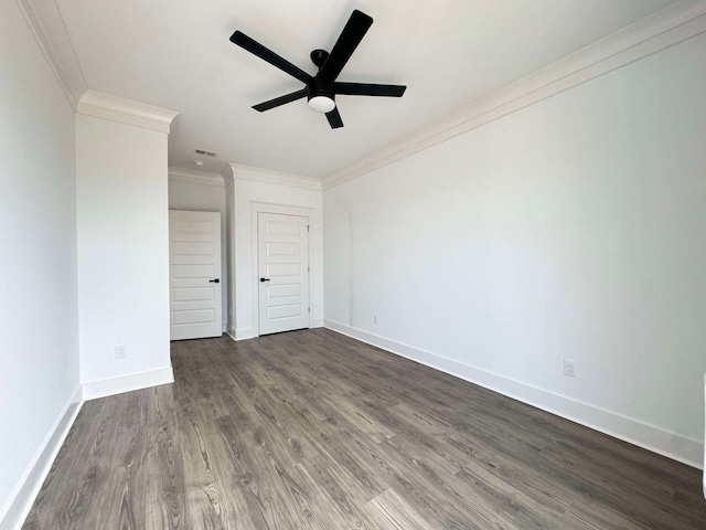 spare room featuring ceiling fan, wood-type flooring, and ornamental molding