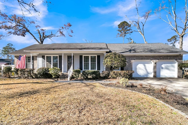 single story home with a front yard and a garage