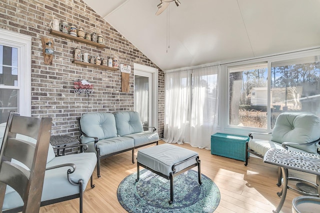 sunroom / solarium with vaulted ceiling