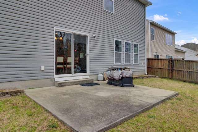 view of patio featuring fence