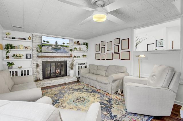 1032 Windward Rd, Charleston, SC 29412 - living room featuring wood finished floors, ceiling fan, and a large fireplace