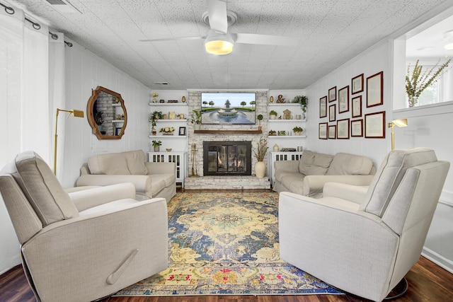 1032 Windward Rd, Charleston, SC 29412 - living area with ceiling fan, wood finished floors, and a large fireplace