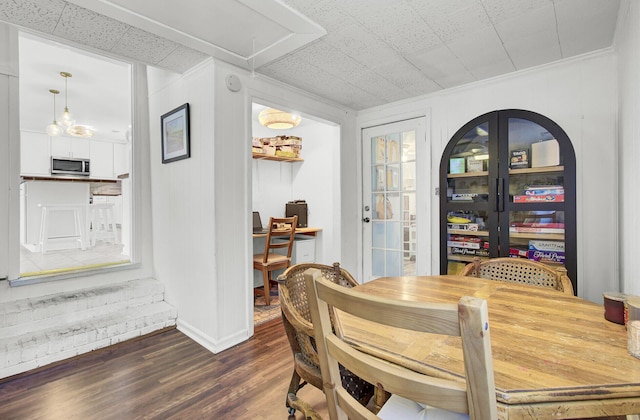 1032 Windward Rd, Charleston, SC 29412 - dining room featuring attic access, dark wood finished floors, and crown molding