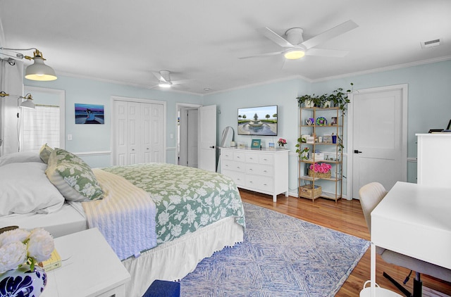 1032 Windward Rd, Charleston, SC 29412 - bedroom featuring crown molding, wood finished floors, a closet, and ceiling fan