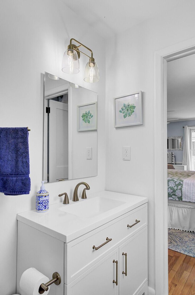1032 Windward Rd, Charleston, SC 29412 - bathroom featuring vanity, connected bathroom, and wood finished floors
