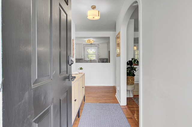 1032 Windward Rd, Charleston, SC 29412 - foyer entrance with light wood finished floors and arched walkways