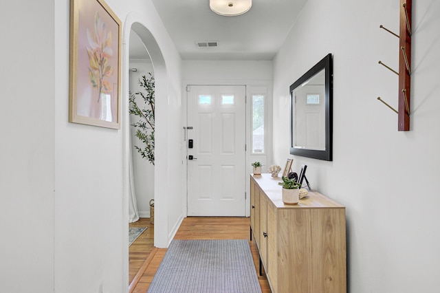 1032 Windward Rd, Charleston, SC 29412 - entryway with light wood finished floors and arched walkways