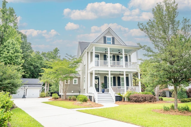 1566 Lindsey Creek Dr, Mount Pleasant, SC 29466 - view of front of home with a ceiling fan, a porch, a balcony, a front yard, and an outbuilding