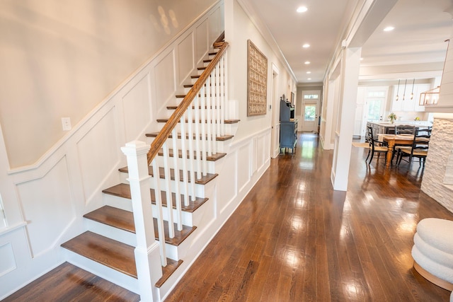 1566 Lindsey Creek Dr, Mount Pleasant, SC 29466 - stairway with a decorative wall, ornamental molding, hardwood / wood-style floors, wainscoting, and recessed lighting