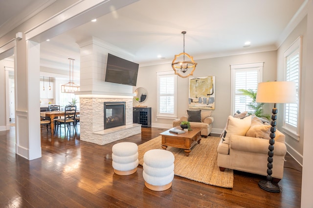 1566 Lindsey Creek Dr, Mount Pleasant, SC 29466 - living area with dark wood-type flooring, ornamental molding, baseboards, and recessed lighting