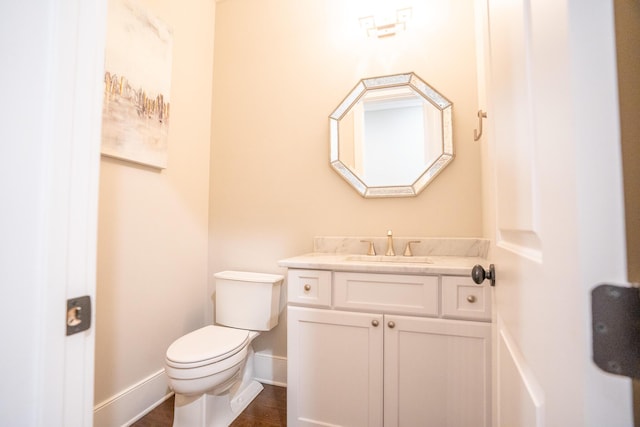 1566 Lindsey Creek Dr, Mount Pleasant, SC 29466 - half bathroom featuring vanity, toilet, baseboards, and wood finished floors