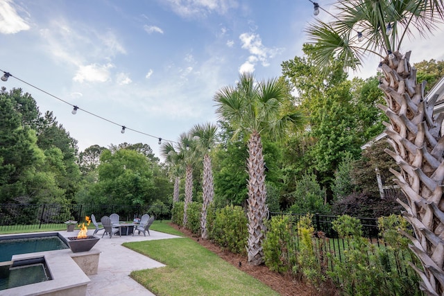 1566 Lindsey Creek Dr, Mount Pleasant, SC 29466 - view of yard featuring an outdoor fire pit and a patio