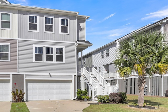 view of front of property featuring a garage and a front yard