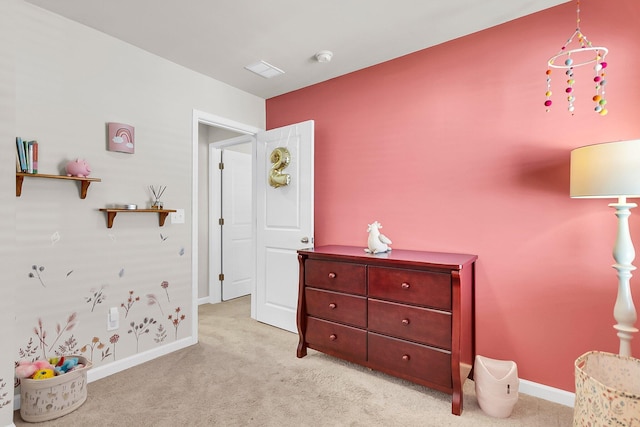 bedroom with light carpet