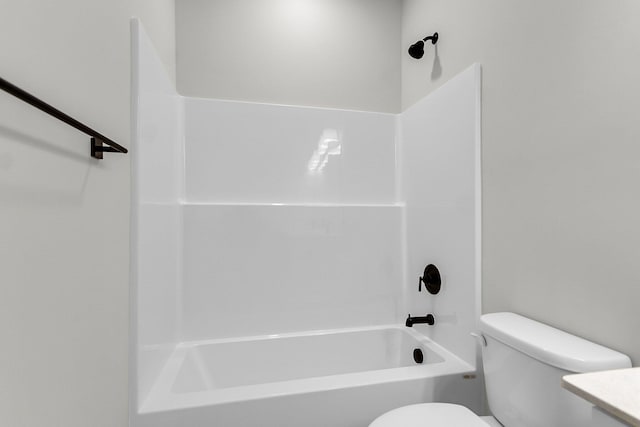 full bathroom featuring toilet and shower / washtub combination