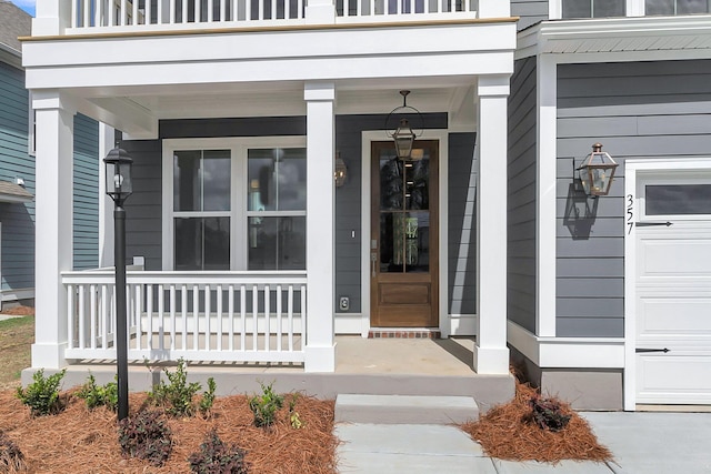 doorway to property with covered porch