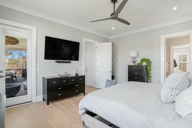 bedroom featuring visible vents, light wood finished floors, access to exterior, crown molding, and multiple windows