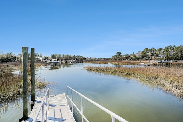 view of dock with a water view