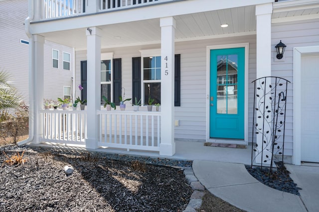 doorway to property with a porch