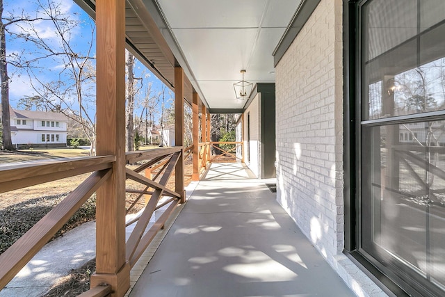 view of patio / terrace with a balcony