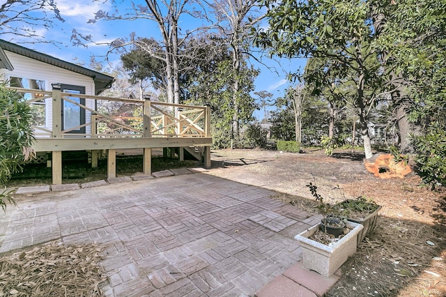 view of patio / terrace featuring a wooden deck