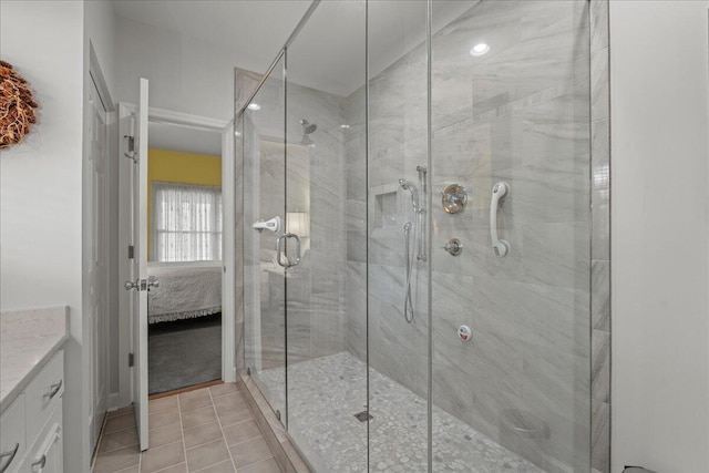 19 Cameroon Dr, Beaufort, SC 29907 - full bathroom featuring vanity, a stall shower, tile patterned floors, connected bathroom, and recessed lighting