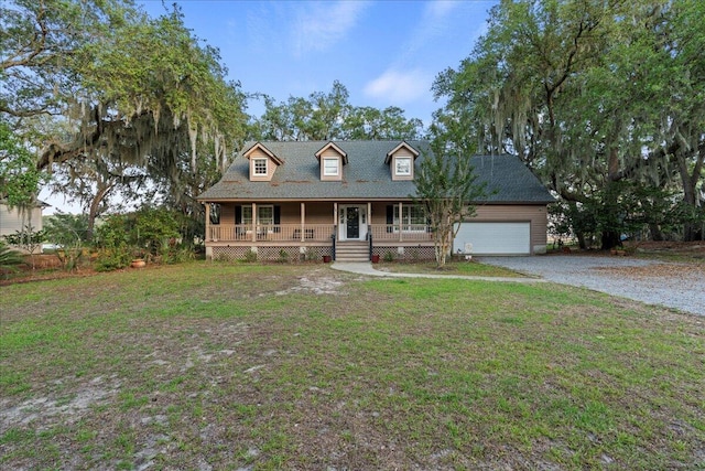 19 Cameroon Dr, Beaufort, SC 29907 - cape cod-style house with a porch, gravel driveway, a front lawn, and a garage