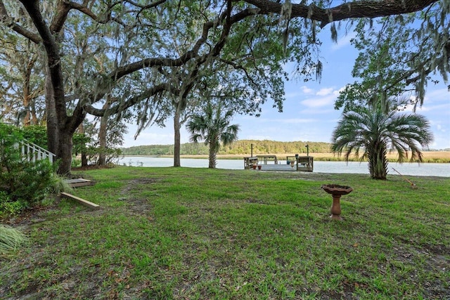 19 Cameroon Dr, Beaufort, SC 29907 - view of green lawn featuring a water view and a boat dock