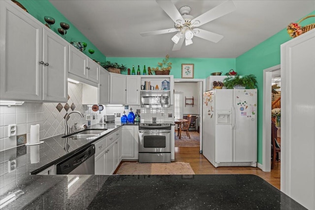 19 Cameroon Dr, Beaufort, SC 29907 - kitchen featuring appliances with stainless steel finishes, open shelves, light wood-type flooring, tasteful backsplash, and a ceiling fan