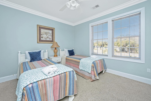 bedroom with ceiling fan and ornamental molding