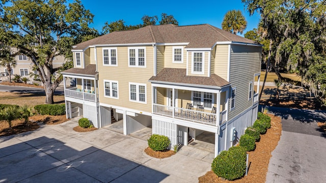 view of front of home featuring a balcony