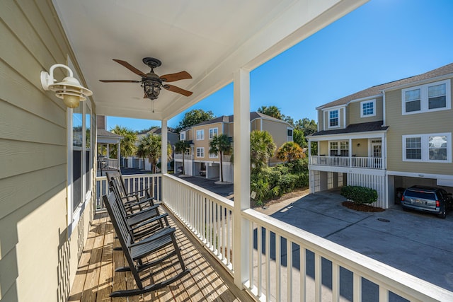 balcony featuring ceiling fan and covered porch