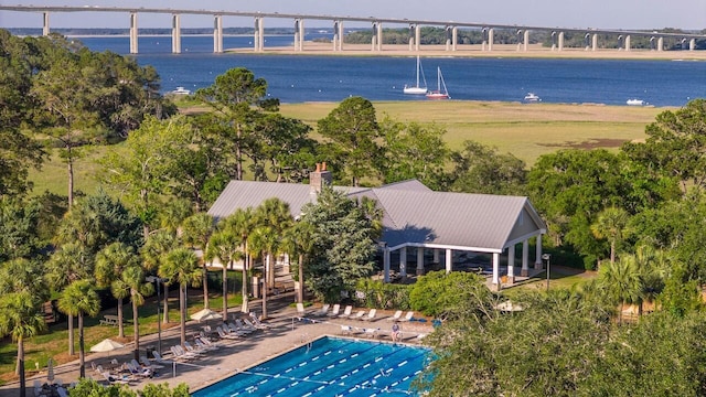 community pool featuring a water view