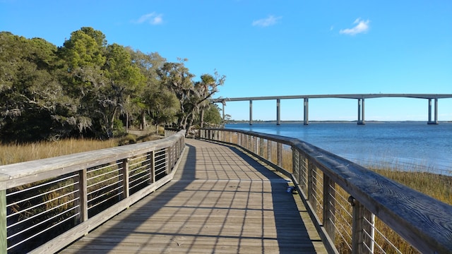 view of community with a water view