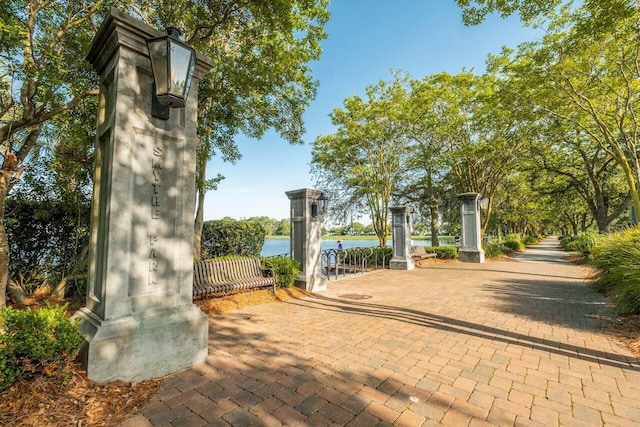 view of home's community featuring a water view