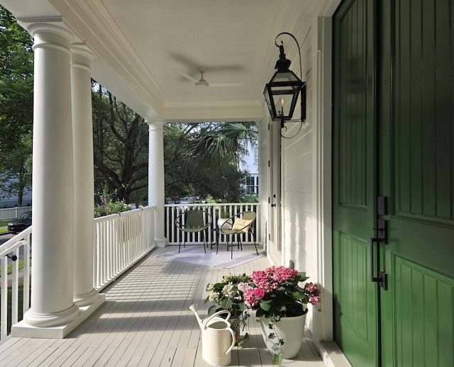 porch with ceiling fan