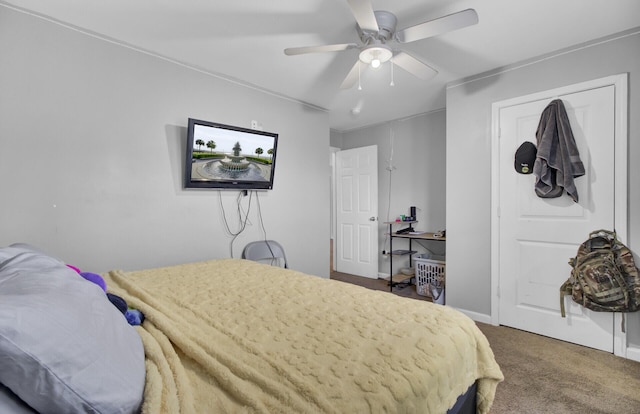 carpeted bedroom with ceiling fan