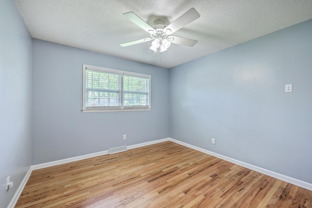 108 Reardon St, Moncks Corner, SC 29461 - empty room featuring light wood-type flooring, a textured ceiling, and ceiling fan