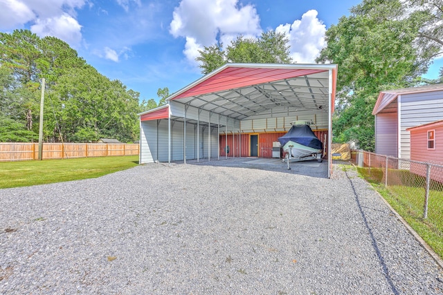 108 Reardon St, Moncks Corner, SC 29461 - view of vehicle parking featuring a detached carport and gravel driveway