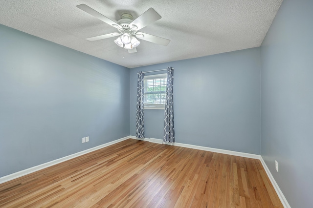 108 Reardon St, Moncks Corner, SC 29461 - spare room featuring wood finished floors, a textured ceiling, and ceiling fan