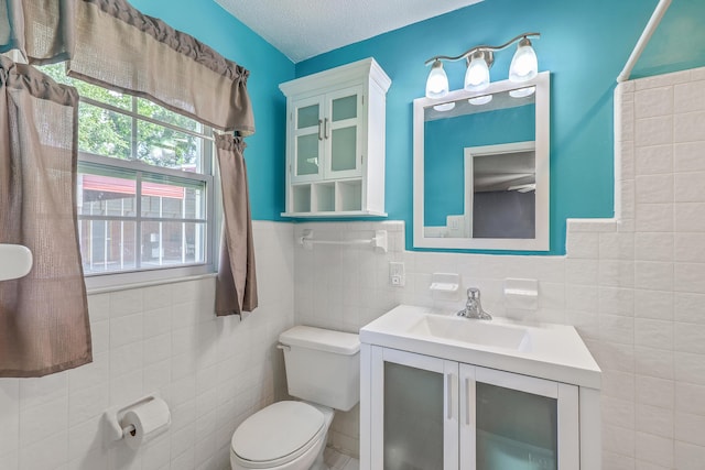 108 Reardon St, Moncks Corner, SC 29461 - bathroom with tile walls, vanity, wainscoting, and a shower with shower curtain